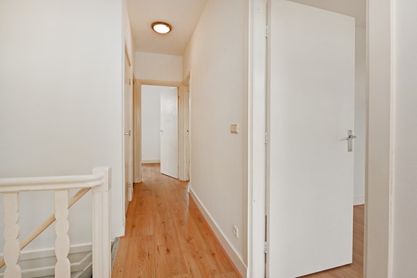 Medium property photo - Deimanstraat 309, 2522 BK Den Haag